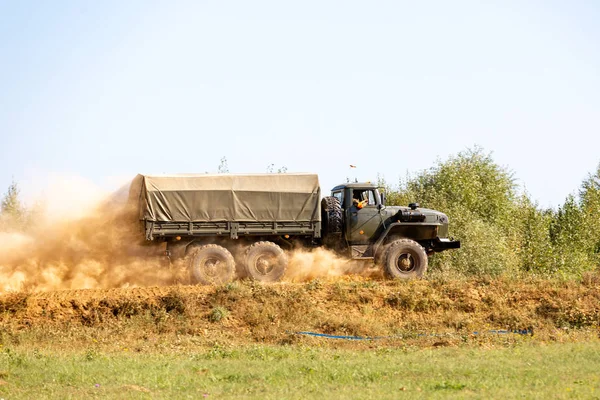 military truck during Military Exercise. war, army, technology and people concept