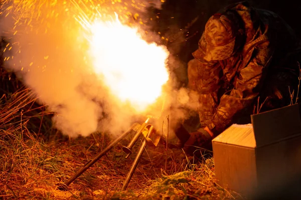 Rocket launch with fire clouds. Battle scene with rocket Missiles with Warhead Aimed at Gloomy Sky at night. Selective focus.