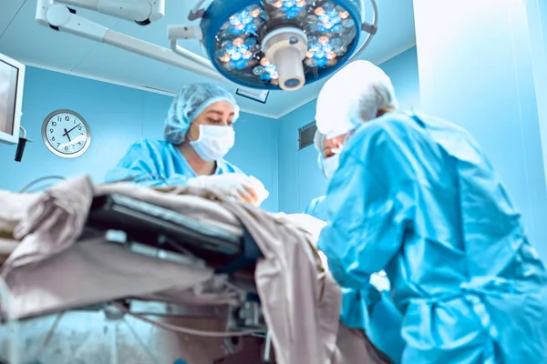 Surgeons team working in the hospital, operating room — Stock Photo, Image