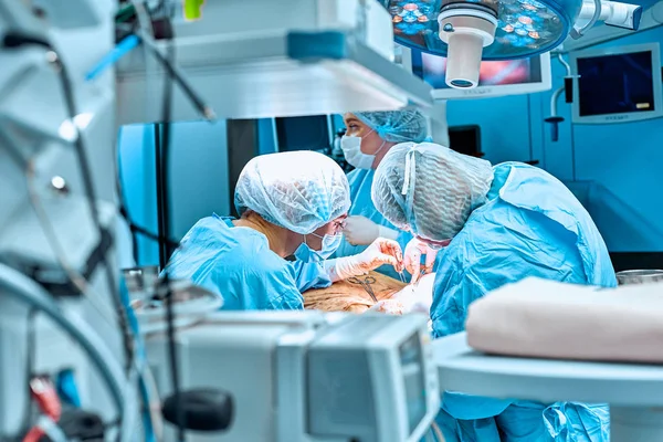 Surgeons team working in the hospital, operating room — Stock Photo, Image