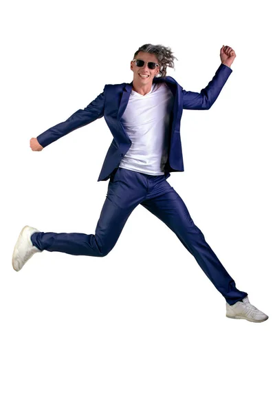 Confident Smart Looking Man Laughing and Jumping Up, Enjoying His Success - Wearing siut, isolated on white background - Real laugh, real jump... — Stock Photo, Image