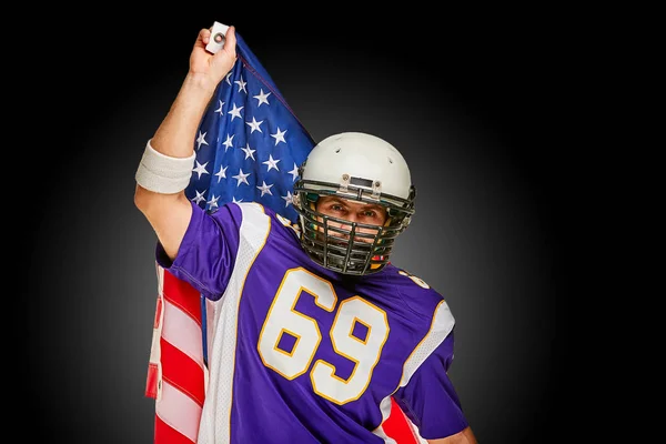 american Football Player with uniform and american flag proud of his country, on a white background.