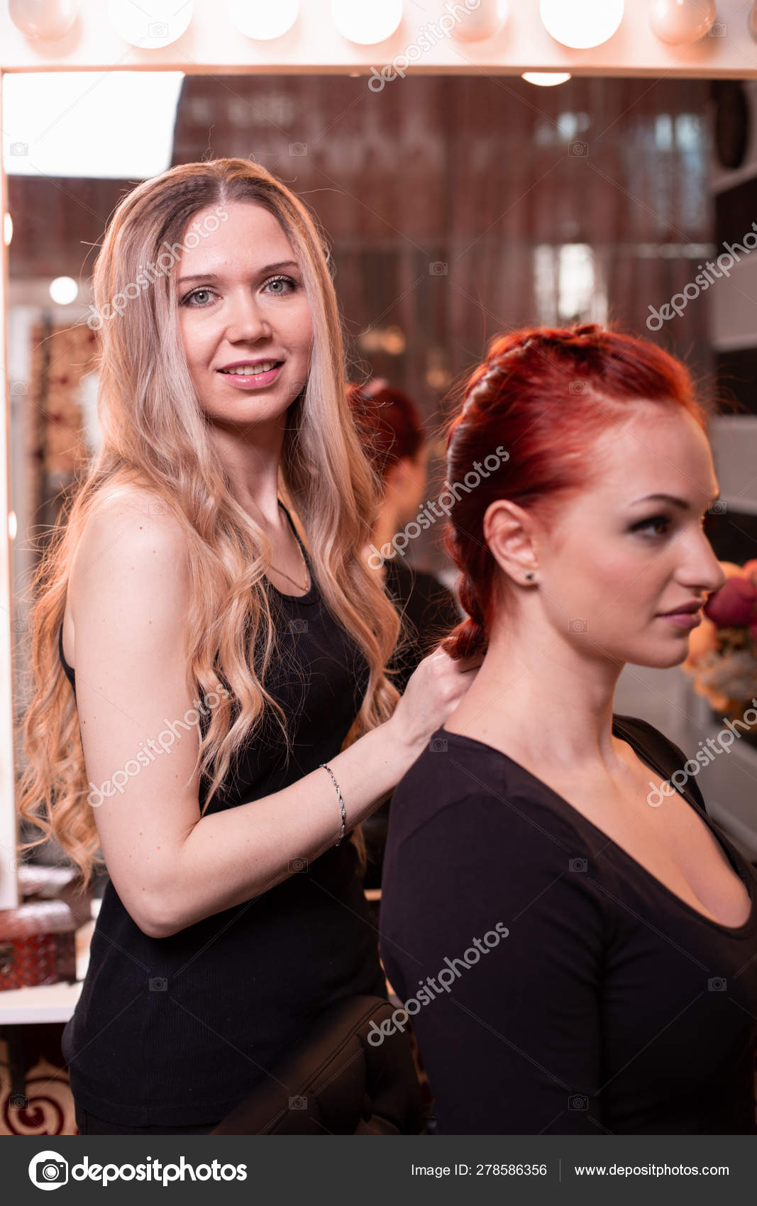 Beautiful Red Haired Girl With Long Hair Hairdresser Weaves A
