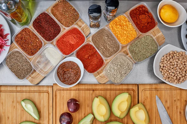 Many different spices, vegetables and ingredients, and fresh herbs for making homemade sauce — Stock Photo, Image