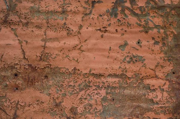 Paslanmış ve oksitlenmiş arka plan. Eski demir panel. Metal plaka üzerinde kırmızı, kahverengi ve siyah pas. Grunge paslanmış metal soyut dokusu. Paslı metal duvar. Paslı paslı metal yüzey..
