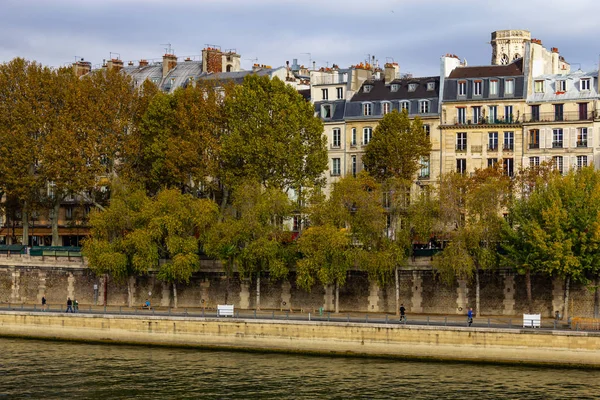 Sena river, trees and buildings, Paris, France