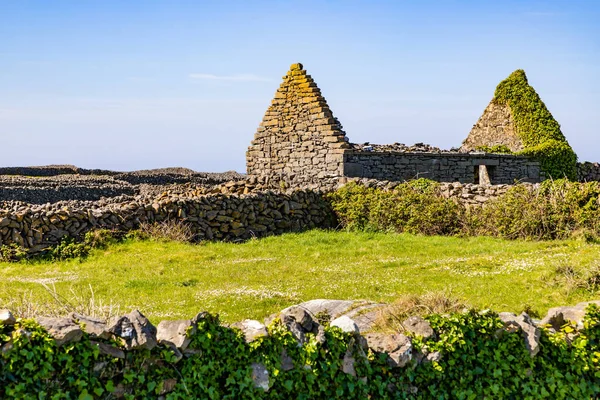 House ruins with stone wall in Inishmore