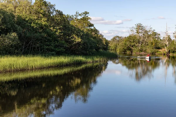 Man in a boat in Owenriff river — Stock Photo, Image