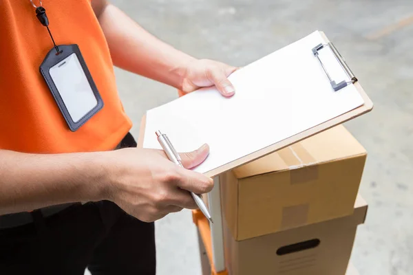 Delivery man with box and prepare to send for customer