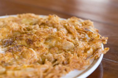 Tay tarzında domuz omlet