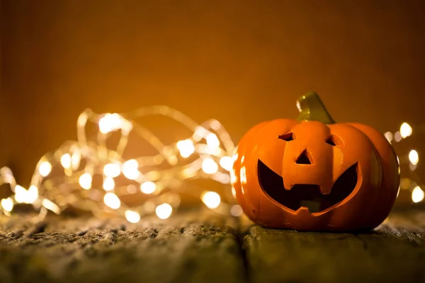 Calabaza Halloween Iluminación Sobre Fondo Madera — Foto de Stock