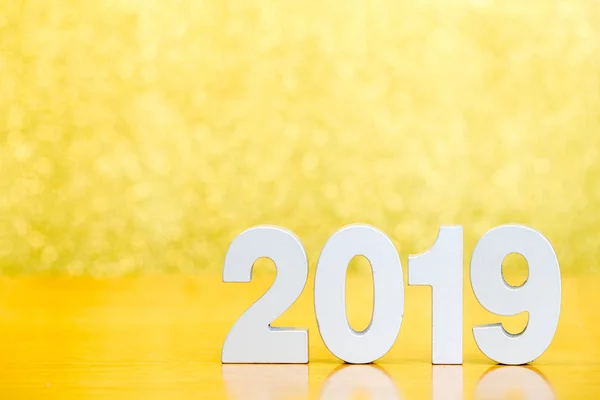 Number 2019 Happy New Year Wooden Table Golden Bokeh Background — Stock Photo, Image