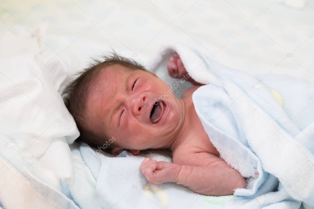 Asian baby crying and two week old