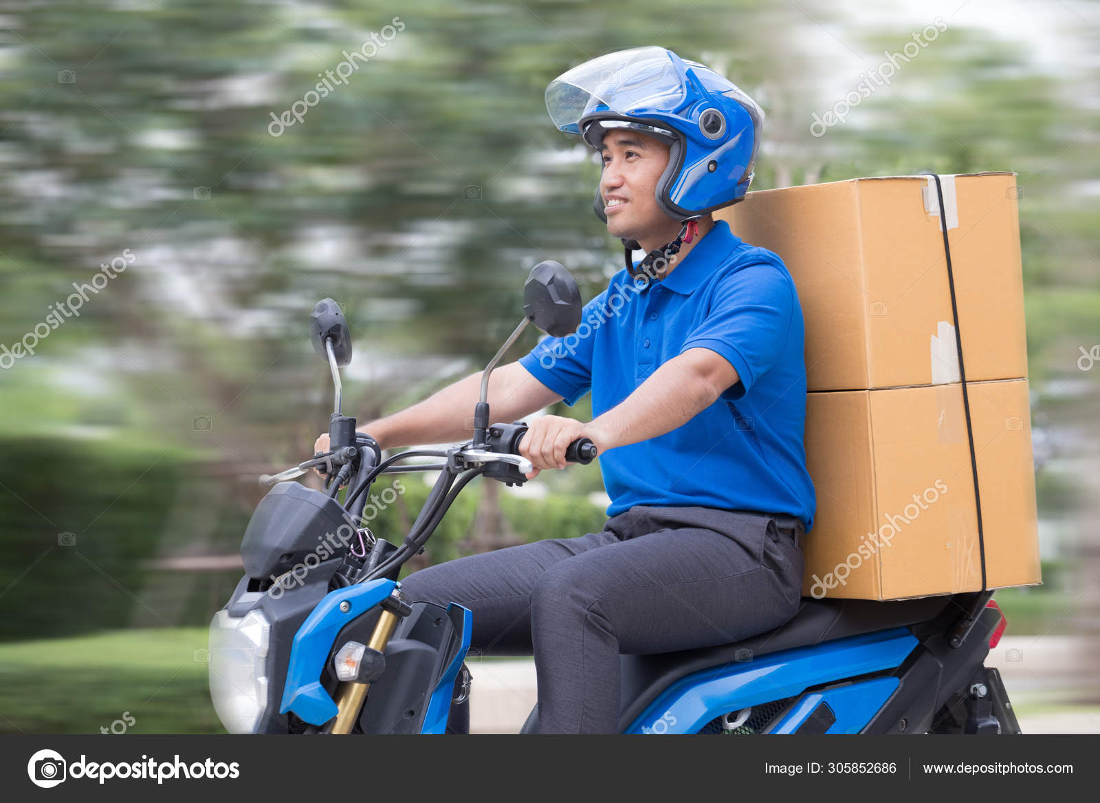 Courier delivering parcel box by motorcycle or Fast
