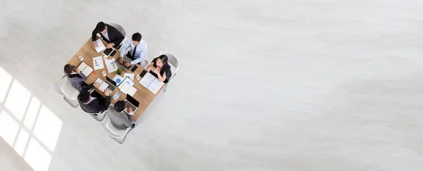 Top view of group of multiethnic busy people working in an office
