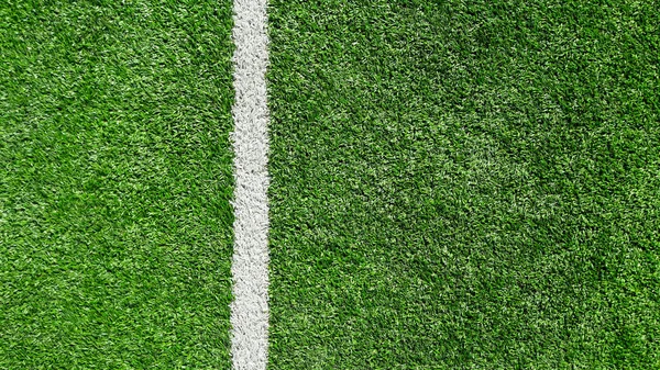 上から見た緑のサッカー場の白い縞 — ストック写真