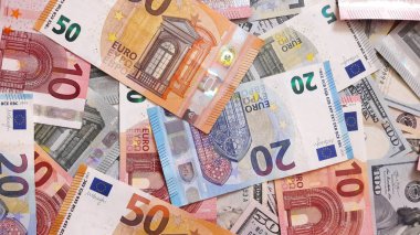 Para ile arka plan. Euro ve dolar