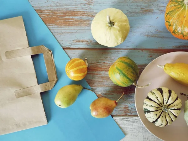 Vegetables and fruits, a package of products from the market for cooking healthy food, on the table, top view, seasonal food