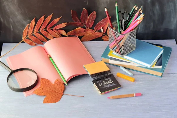 School stationery on desk, home learning concept, part of kids room interior, back to school