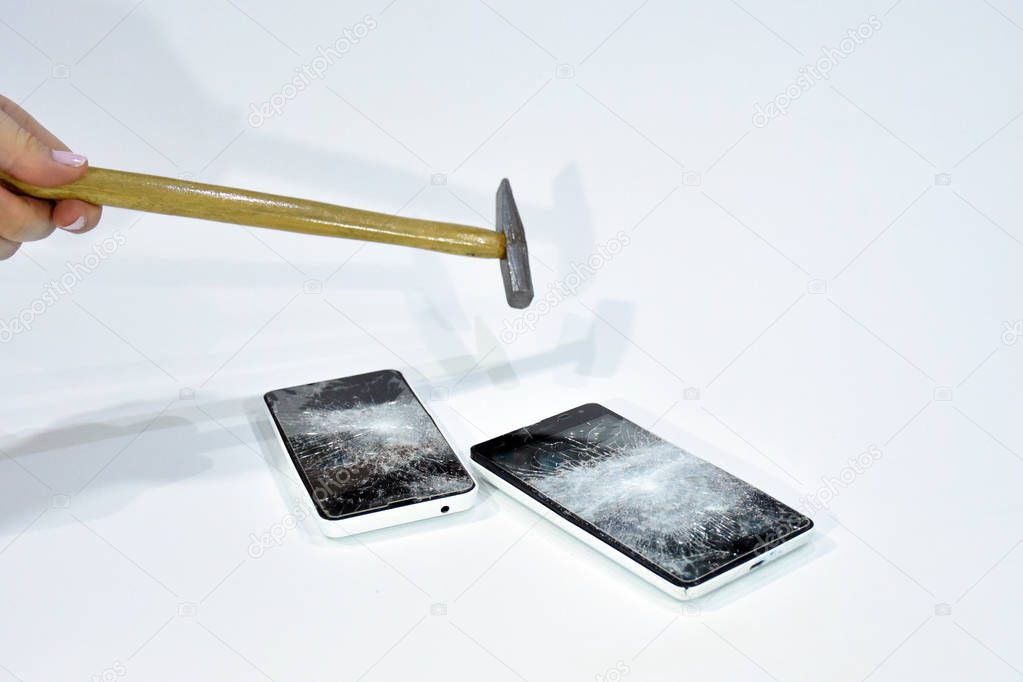 Cell phone with the screen broken by a hammer