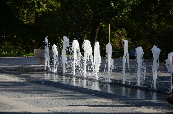 Water Fountain from the ground. Pure water in garden in europe. European afternoon overlooking thermal water fountain.