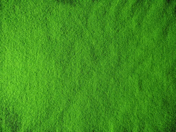 Texture of homogeneous felt, plain green fabric background — Stock Photo, Image