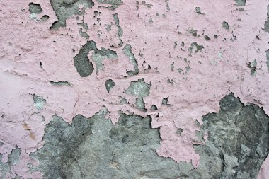 Duvarın dokusu pembe ve gri tonlarda boyanmış..