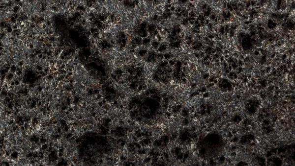 暗い粗い石の表面の背景 — ストック写真