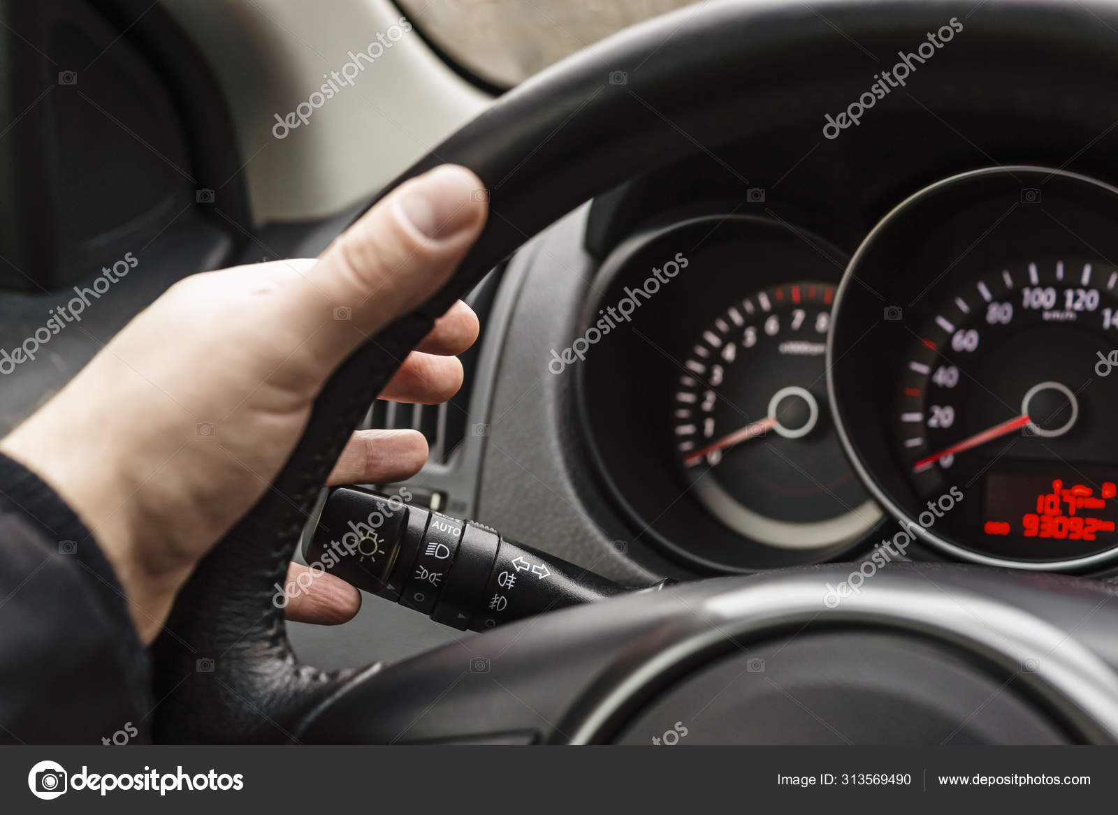 Driver's Hand Steering Wheel Turns Turn Signal Stock Photo by