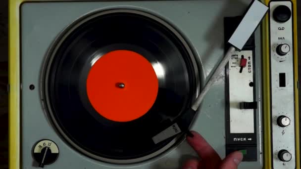 Finger Puts Needle Vinyl Record Spinning Retro Turntable — Stock Video