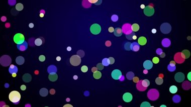 Koyu mavi bir arka plan üzerinde düşen renkli konfeti