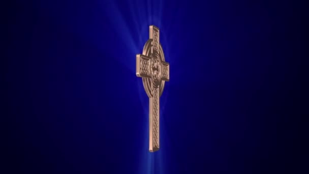 Celtic cross rotates around an axis on a dark blue background. Seamless looping — Stock Video