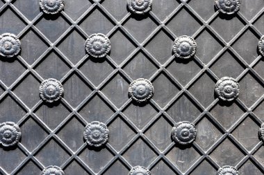 close-up view of decorative black metal gate background clipart