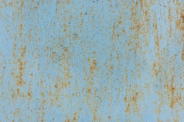 close-up view of old scratched blue wall with rust background clipart