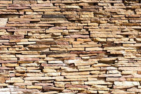 brown brick wall background, full frame view