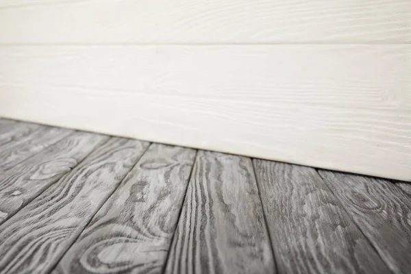 Grey Wooden Floor White Wooden Wall — Free Stock Photo