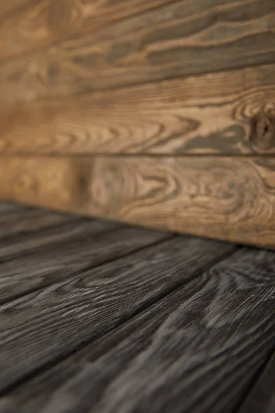 Grey Wooden Floor Brown Wooden Wall — Free Stock Photo