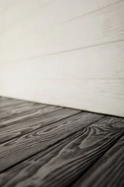 Grey Wooden Floor White Wooden Wall — Free Stock Photo