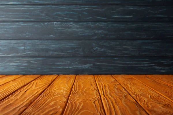 Orange Striped Floor Dark Blue Wooden Wall — Stock Photo, Image