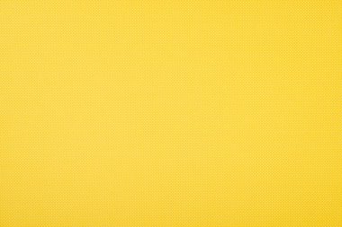 Texture of polka dot pattern on yellow background clipart