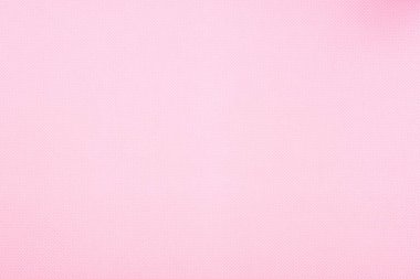Texture of polka dot pattern on pink background
