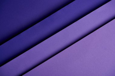 Pattern of overlapping paper sheets in purple tones clipart