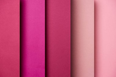 Kağıt sayfalarının pembe ve pembe tonlarında çakışan desen