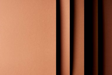 Abstract background with paper sheets in brown tones