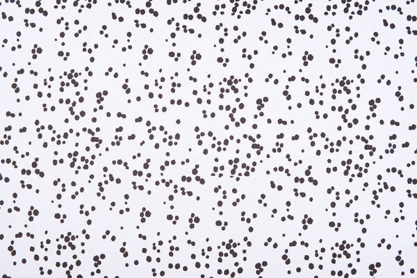 Abstract pattern with dark stains and dots on white background