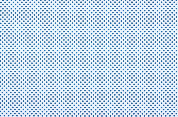 Blue polka dot pattern on white background