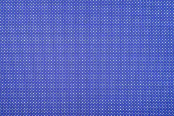 Texture of polka dot pattern on blue background
