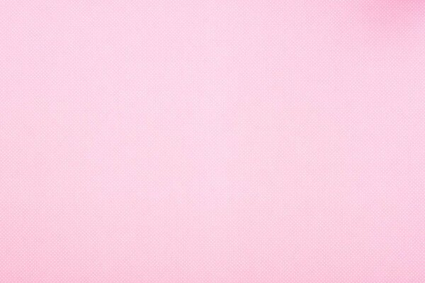Texture of polka dot pattern on pink background
