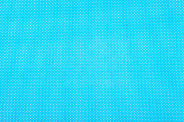 Texture of polka dot pattern on blue background