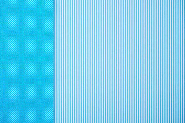 Abstract background with blue striped and polka dot patterns